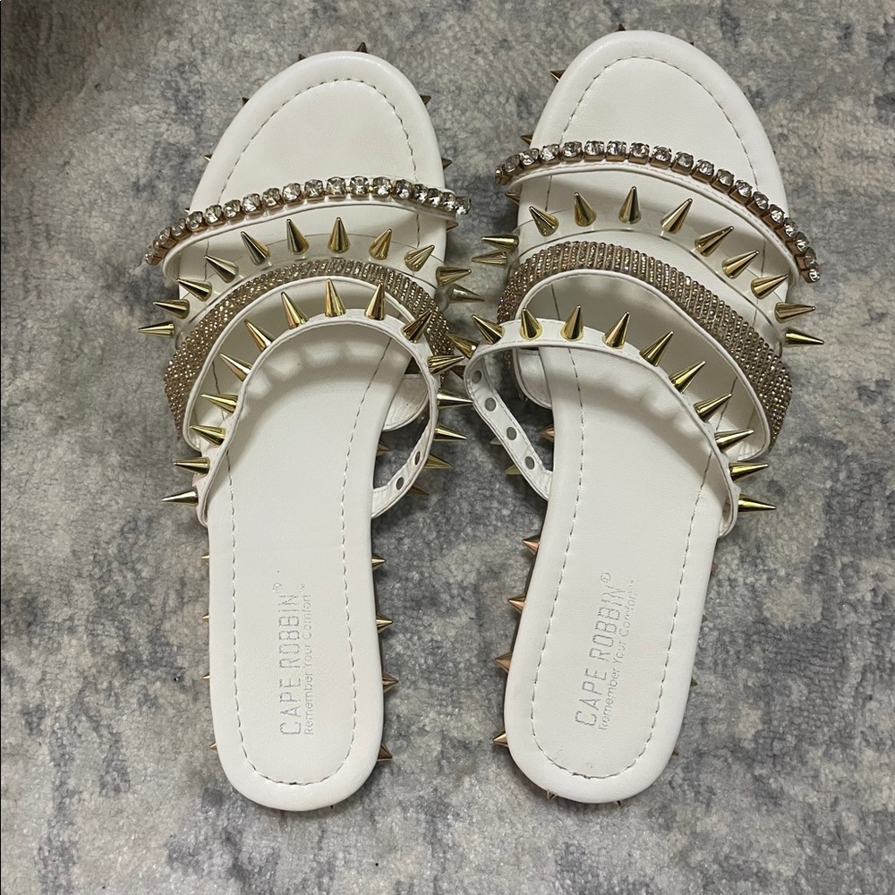 White spike sandals